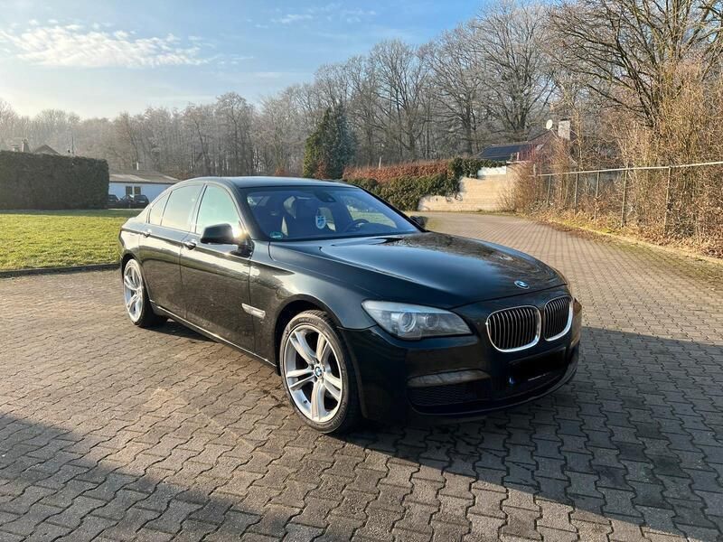Schwarz Gebraucht 2011 BMW 740 M Sport Limousine | 11.999 € (Fairer Preis) - Bild 1/4