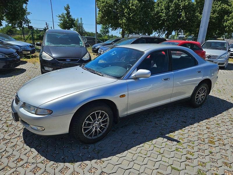 Silber Gebraucht 1997 Mazda 6 Limousine | 1.599 € - Bild 1/4