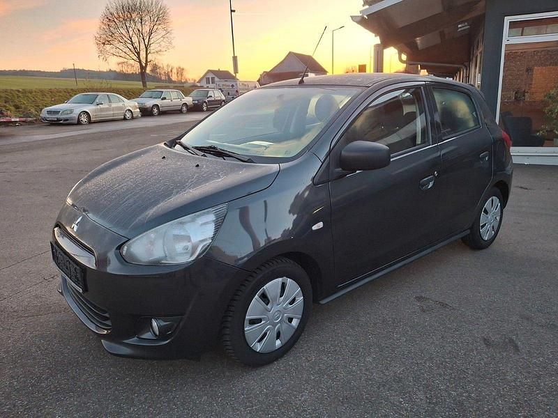 Grau Gebraucht 2015 Mitsubishi Space Star Kleinwagen | 3.800 € (Fairer Preis) - Bild 1/4