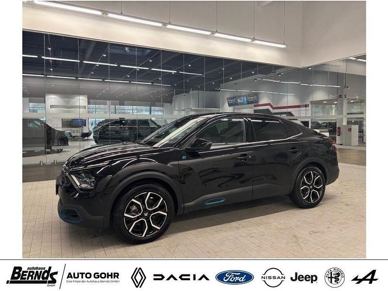 Schwarz Gebraucht 2023 Citroën e-C4 Shine Limousine | 20.470 € (Guter Preis) - Bild 1/4