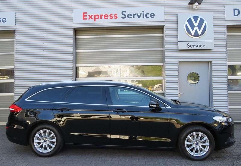Iridiumschwarz metallic Gebraucht 2018 Ford Mondeo Business Edition Kombi | 16.990 € (Fairer Preis) - Bild 1/4