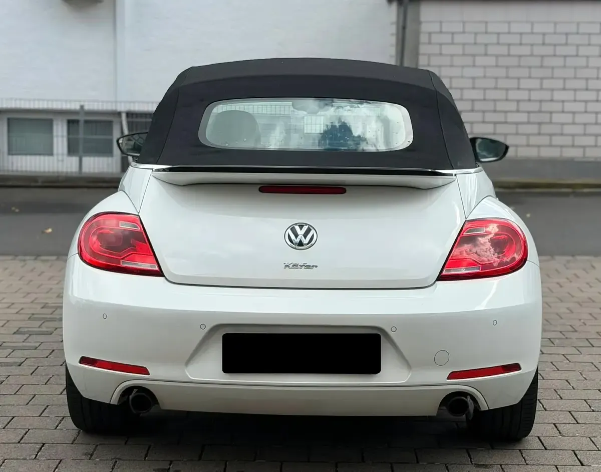 Używany VW Beetle Cabriolet Exclusive 211 KM (155 kW) 2014 Biały Kabriolet