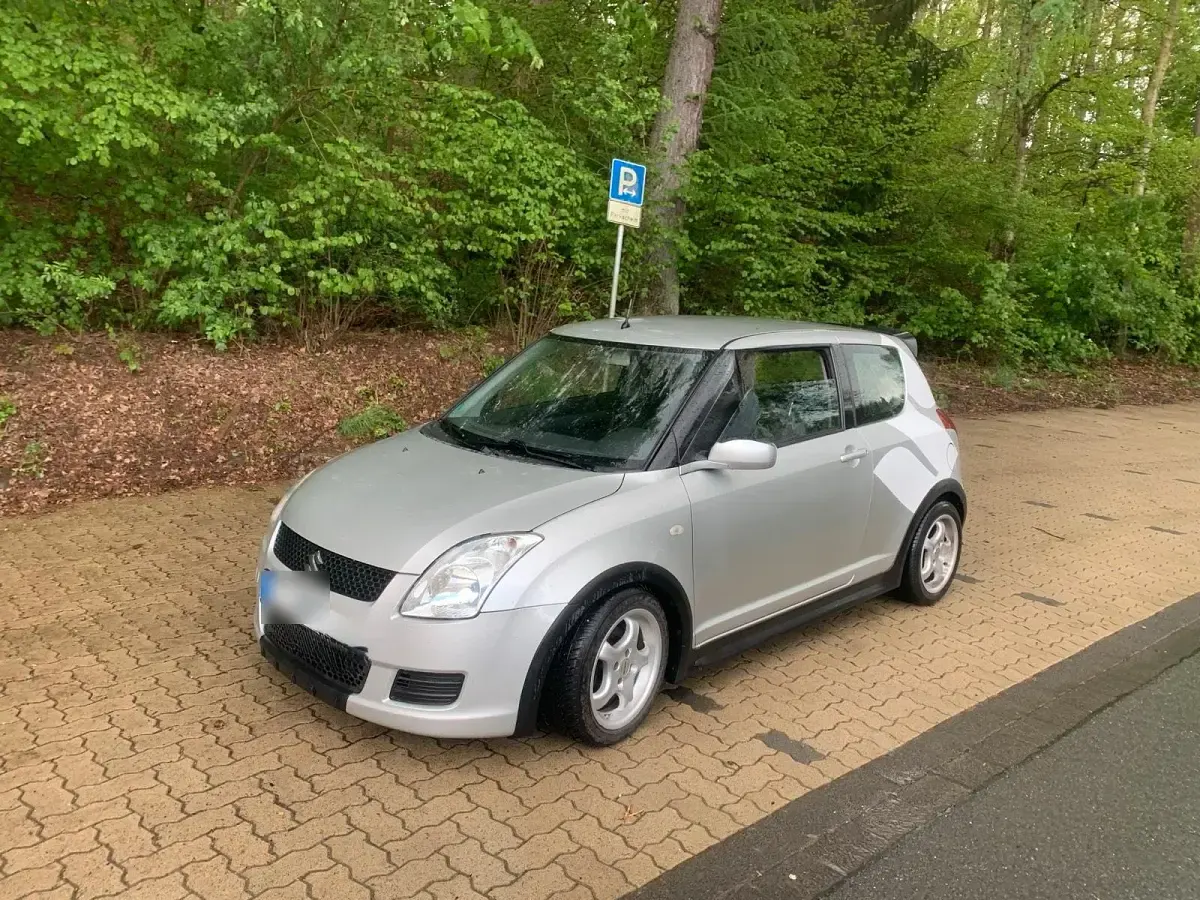Gebraucht Suzuki Swift 92 PS (67 kW) 2010 Silber Kleinwagen