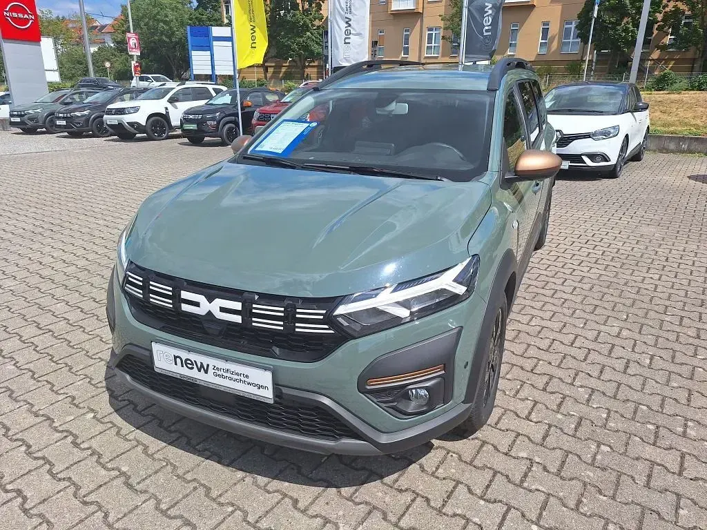 Gebraucht Dacia Jogger Extreme 110 PS (80 kW) 2023 Safarigrüngrau metallic Van / Kleinbus