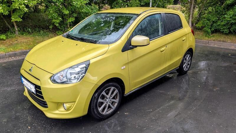Gelb Gebraucht 2015 Mitsubishi Space Star Kleinwagen | 4.200 € (Fairer Preis) - Bild 1/4