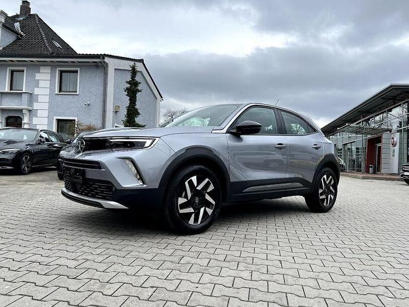 Gebraucht Opel Mokka Elegance 131 PS (96 kW) 2022 Kontrast grau / quarz silber m SUV