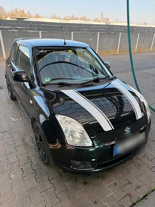 Schwarz Gebraucht 2010 Suzuki Swift Kleinwagen | 2.550 € - Bild 1/4