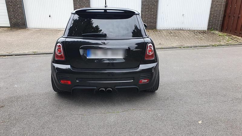 Gebraucht Mini John Cooper Works 210 PS (154 kW) 2011 Schwarz Kleinwagen
