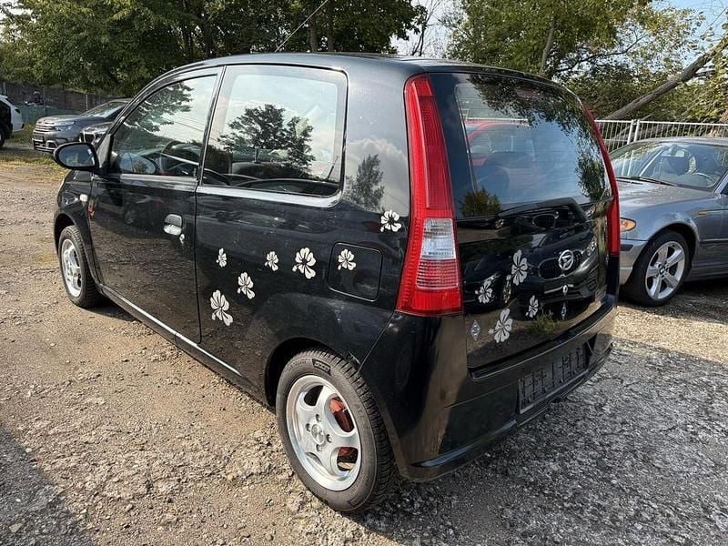 Gebraucht Daihatsu Cuore 58 PS (42 kW) 2006 Schwarz Kleinwagen
