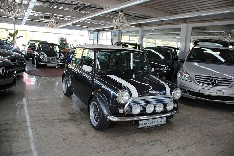 Gebraucht Mini Cooper 63 PS (46 kW) 1998 Schwarz Kleinwagen