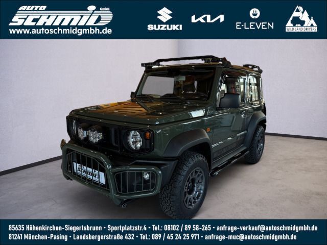 Grün Gebraucht 2023 Suzuki Jimny Comfort SUV | 49.390 € - Bild 1/4