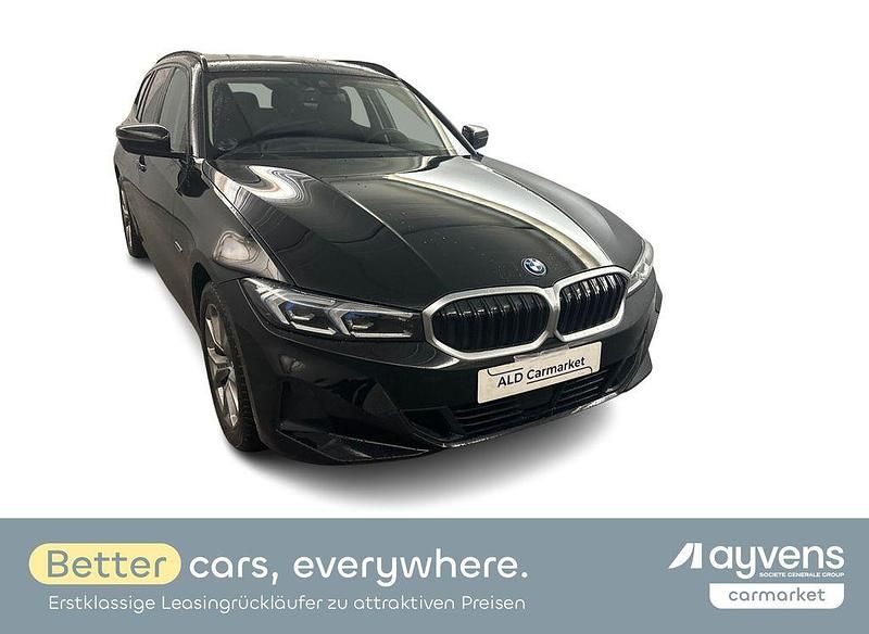Schwarz ii Gebraucht 2022 BMW 320e Sport Line Kombi | 26.980 € (Fairer Preis) - Bild 1/4