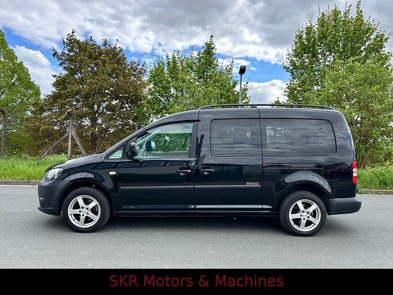 Second-hand VW Caddy 109 CP (80 kW) 2011 Negru Monovolum