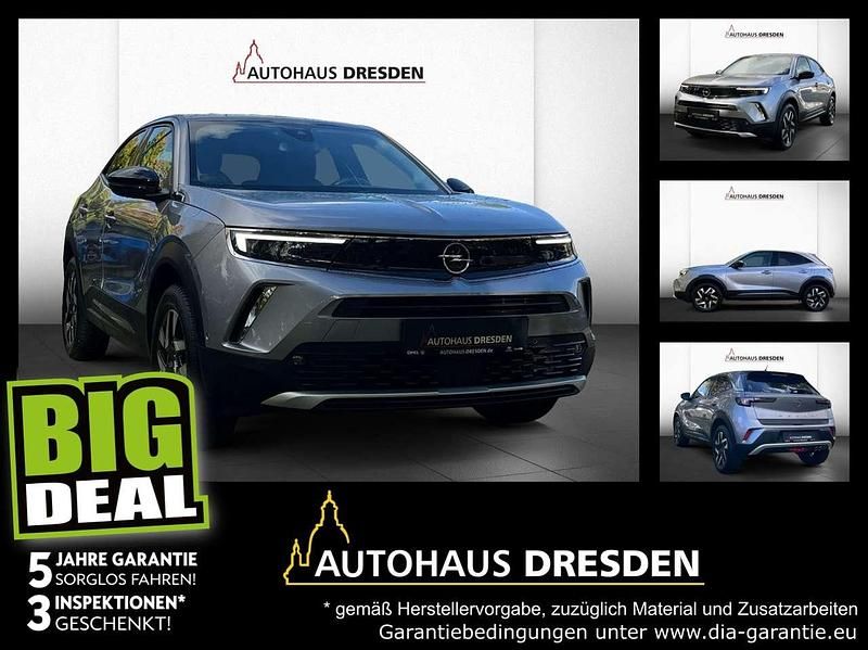 Kontrast grau (metallic) Gebraucht 2022 Opel Mokka Elegance SUV | 18.450 € (Guter Preis) - Bild 1/4