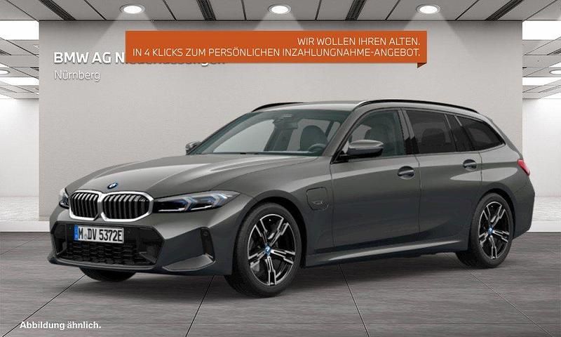 Grau Gebraucht 2022 BMW 320e Sport Line Kombi | 32.690 € (Teuer) - Bild 1/4