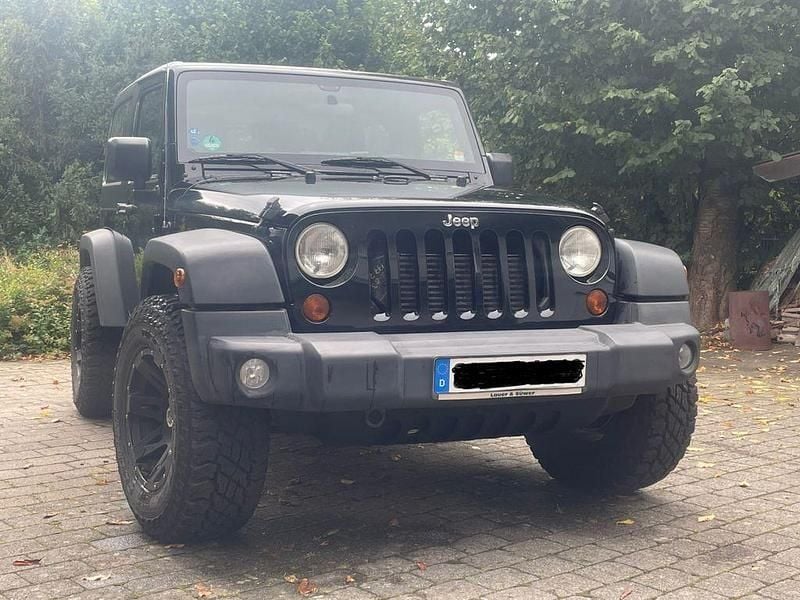 Schwarz Gebraucht 2012 Jeep Wrangler Sport SUV | 22.998 € (Fairer Preis) - Bild 1/4