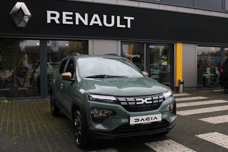 Grün "flechtengrau" Gebraucht 2023 Dacia Spring Extreme Kleinwagen | 13.490 € (Fairer Preis) - Bild 1/4