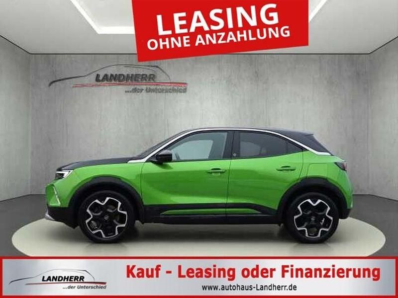 Grün Gebraucht 2021 Opel Mokka-e Ultimate SUV | 16.295 € - Bild 1/4