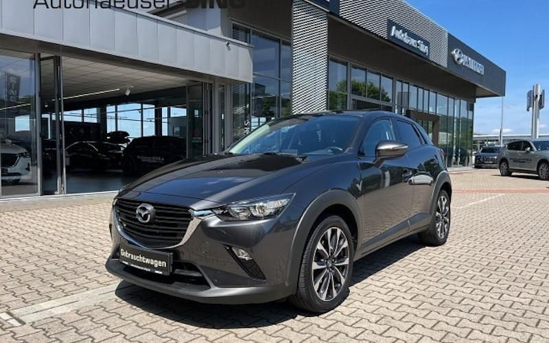 Machine gray Gebraucht 2021 Mazda CX-3 Ad'Vantage SUV | 17.490 € (Guter Preis) - Bild 1/4