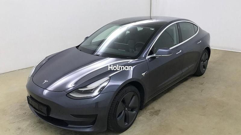 Grau Gebraucht 2020 Tesla Model 3 Standard Range Plus Limousine | 19.753 € (Fairer Preis) - Bild 1/4
