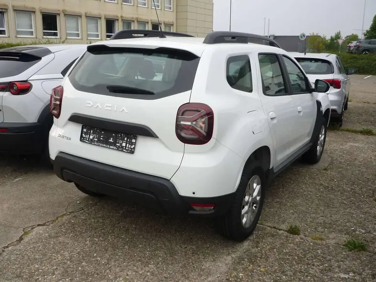 Gebraucht Dacia Duster Expression 131 PS (96 kW) 2023 Sandstone beigemetallic SUV