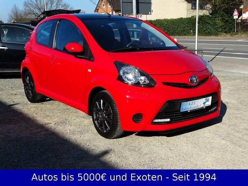 Gebraucht Toyota Aygo 68 PS (50 kW) 2014 Rot Kleinwagen
