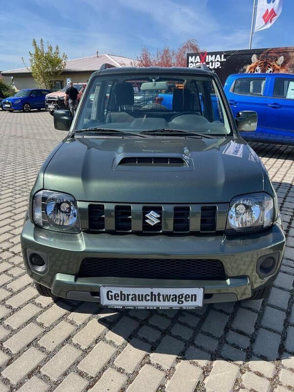 Grün Gebraucht 2018 Suzuki Jimny Ranger Comfort SUV | 17.995 € (Fairer Preis) - Bild 1/4