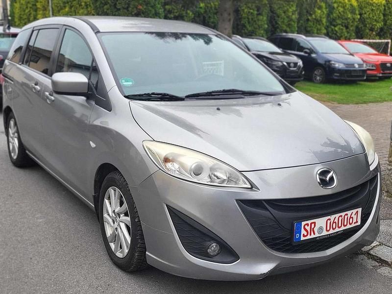 Plutossilber metallic Gebraucht 2011 Mazda 5 Center-Line Van / Kleinbus | 2.600 € (Guter Preis) - Bild 1/4