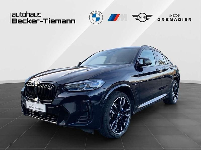 M carbonschwarz Gebraucht 2025 BMW X4 M M Sport SUV | 64.902 € (Superpreis) - Bild 1/4