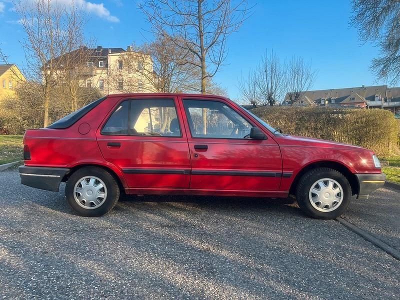 Gebraucht Peugeot 309 75 PS (55 kW) 1992 Rot Kleinwagen