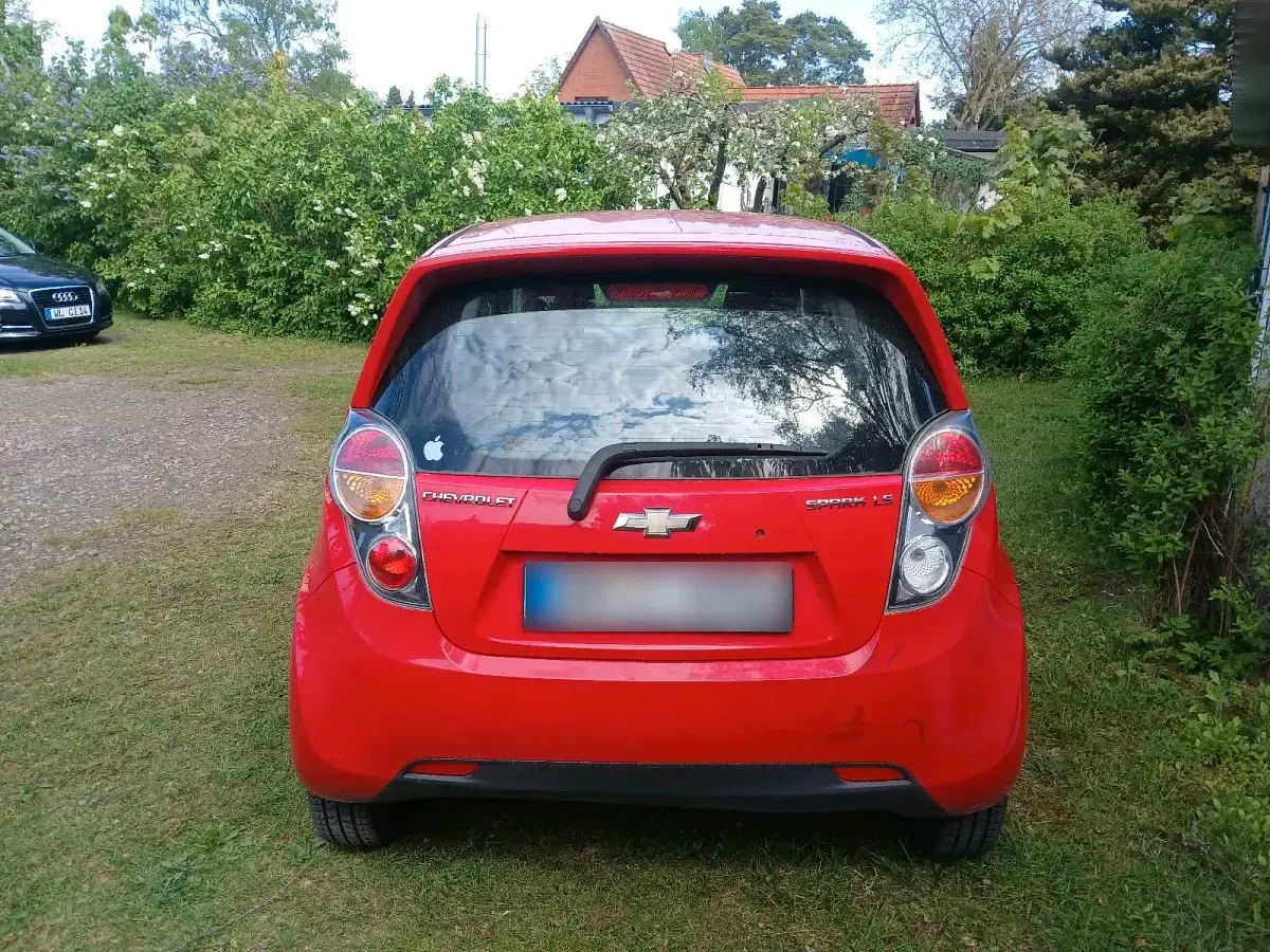 Second-hand Chevrolet Spark 68 CP (50 kW) 2011 Roșu Hatchback