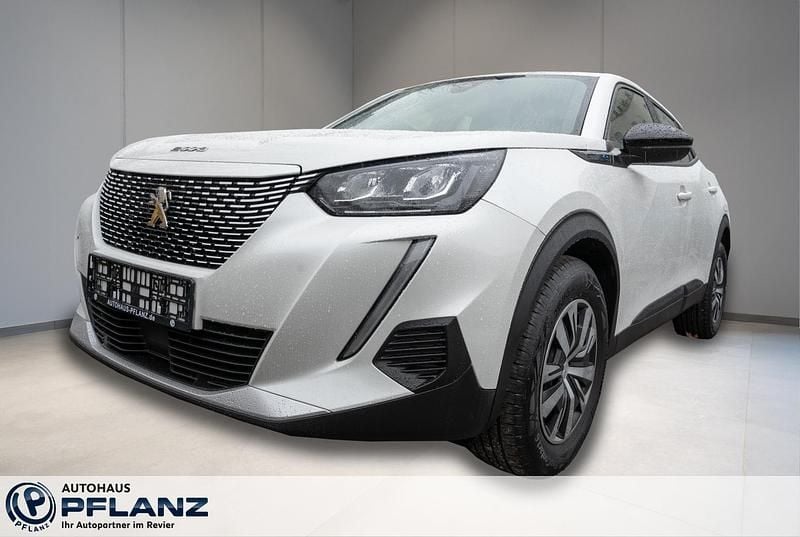 Weiss Gebraucht 2023 Peugeot e-2008 Active SUV | 17.890 € (Superpreis) - Bild 1/4