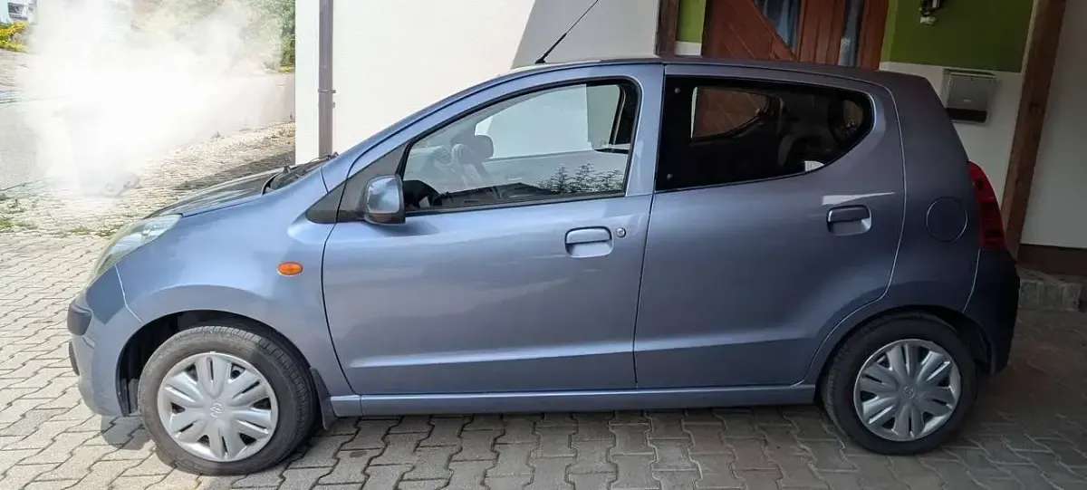 Gebraucht Nissan Pixo Acenta 68 PS (50 kW) 2009 Violett Kleinwagen