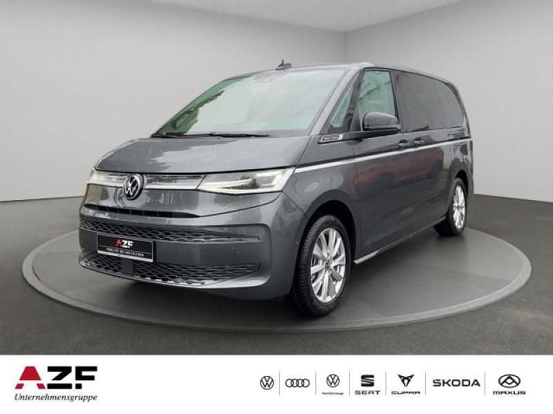 Grau Gebraucht 2025 VW Multivan Style Van | 74.990 € - Bild 1/4