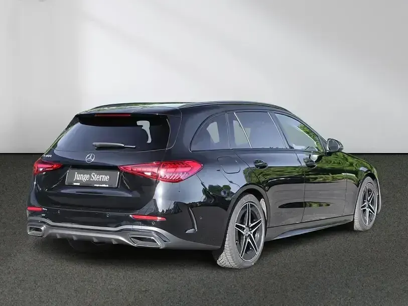 Gebraucht Mercedes C180 AMG 170 PS (125 kW) 2023 Unilack schwarz Kombi
