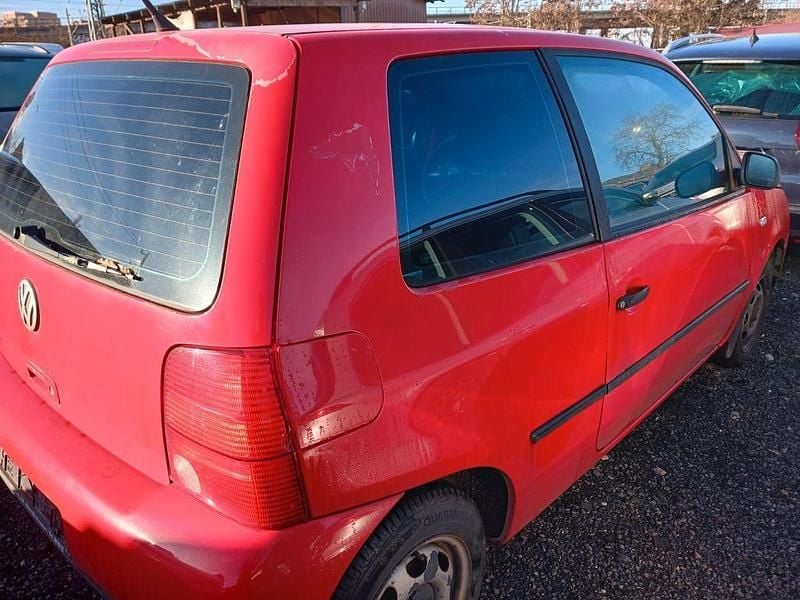Używany VW Lupo Basis 50 KM (36 kW) 1999 Czerwony Hatchback