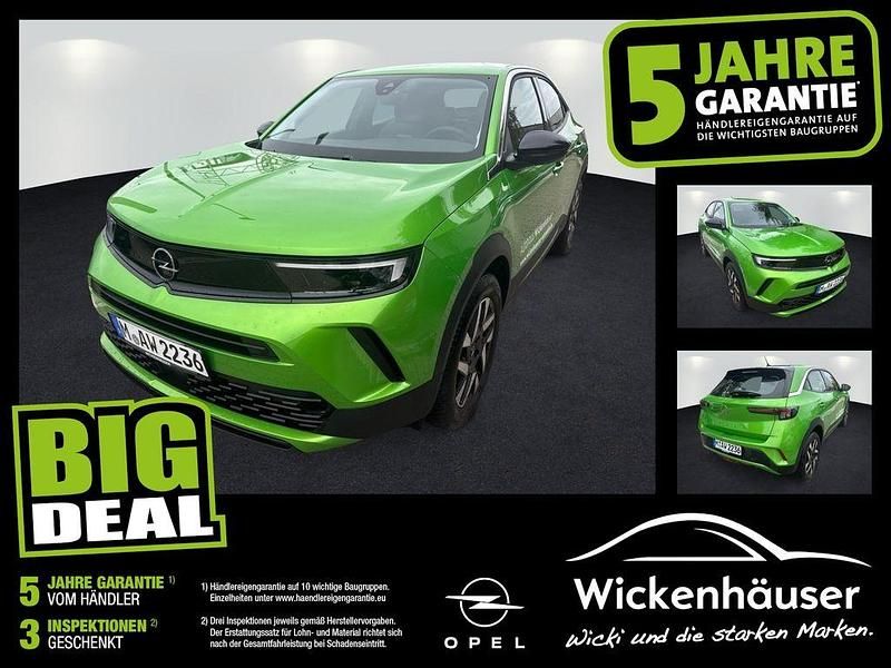 Gebraucht Opel Mokka Elegance 101 PS (74 kW) 2024 Lackierung matcha green/typ au SUV