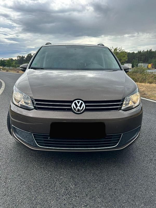 Braun Gebraucht 2012 VW Touran Comfortline Van / Kleinbus | 7.250 € (Guter Preis) - Bild 1/4