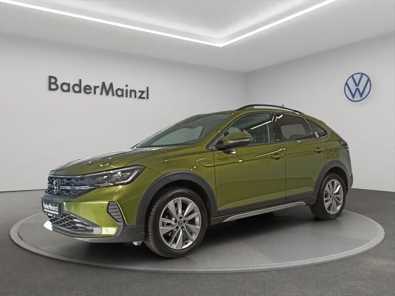 Visual green metallic Gebraucht 2024 VW Taigo Move SUV | 19.930 € (Superpreis) - Bild 1/4