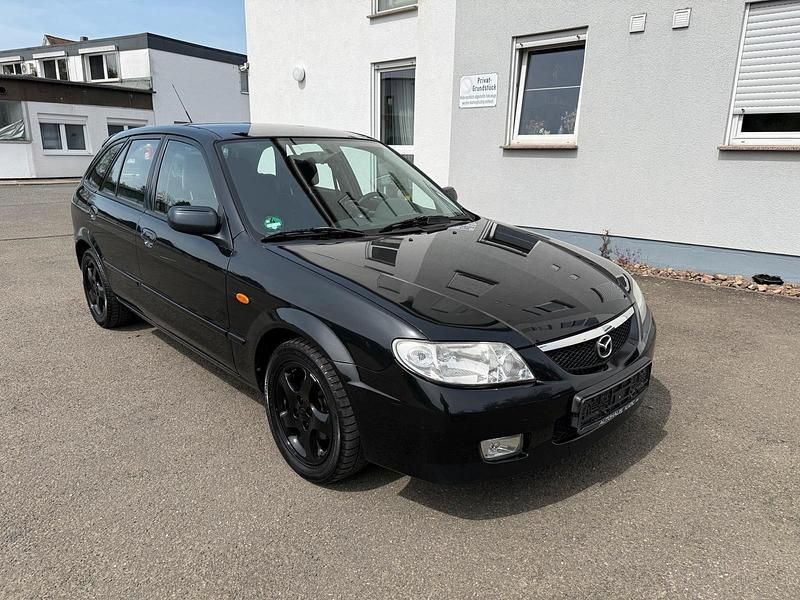 Second-hand Mazda 323F 98 CP (72 kW) 2002 Negru Berlinǎ