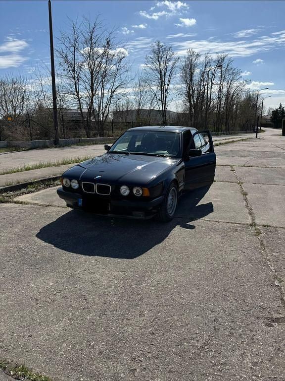 Second-hand BMW 525 Performance 192 CP (141 kW) 1994 Negru Berlinǎ