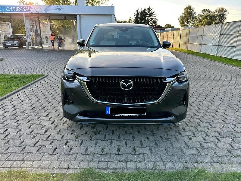 Grau Gebraucht 2025 Mazda CX-60 Takumi-Line SUV | 43.500 € (Superpreis) - Bild 1/4