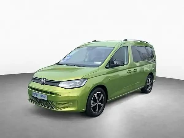 Golden green metallic Neu 2025 VW Caddy Maxi Van / Kleinbus | 50.300 € - Bild 1/4