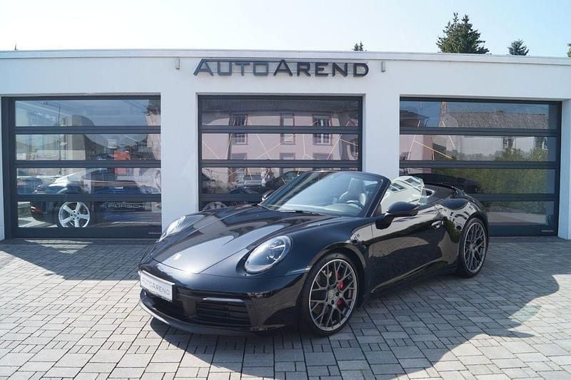 Tiefschwarzmetallic Gebraucht 2021 Porsche 911 Carrera 4S Cabriolet Cabrio | 149.890 € (Fairer Preis) - Bild 1/4
