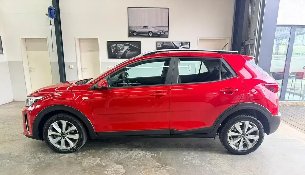 Gebraucht Kia Stonic 101 PS (74 kW) 2023 Signalrot SUV