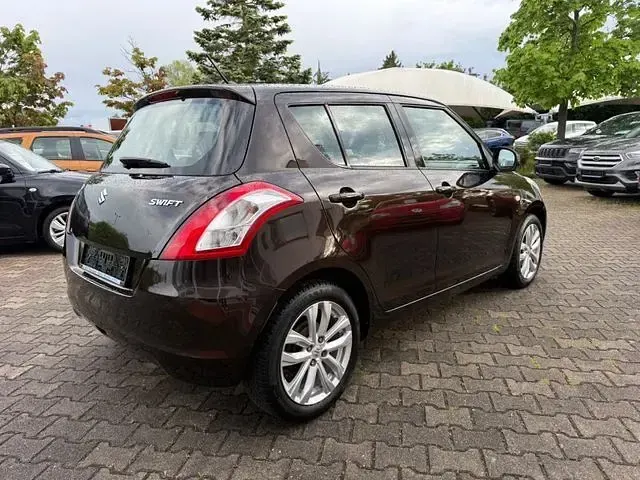 Gebraucht Suzuki Swift Club 94 PS (69 kW) 2015 Braun Kleinwagen