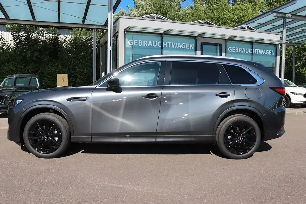 Neu Mazda CX-80 Homura-Line 254 PS (186 kW) 2026 Machine grey SUV