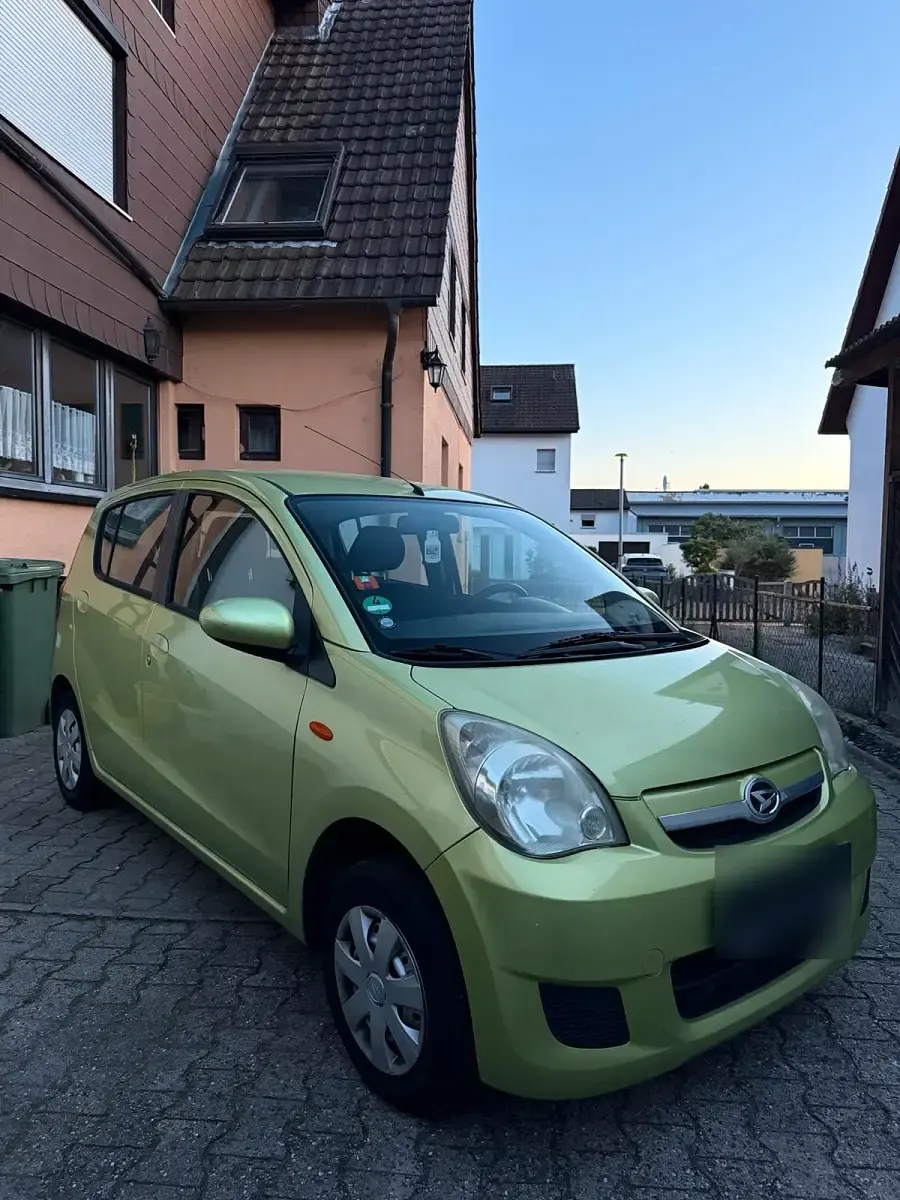 Brugt Daihatsu Cuore 70 HK (51 kW) 2010 Grøn Hatchback