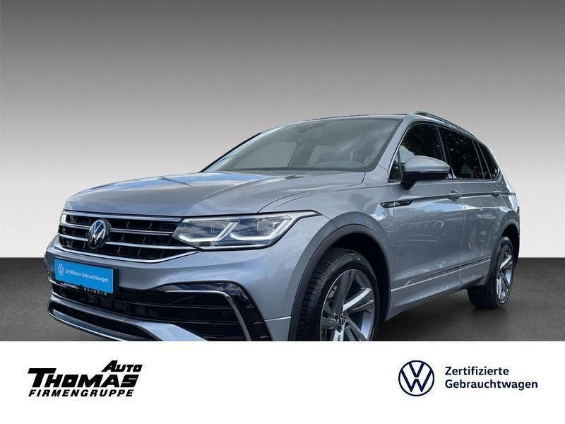 Pyritsilber metallic (metallic) Gebraucht 2024 VW Tiguan Allspace R-line SUV | 47.980 € (Teuer) - Bild 1/3