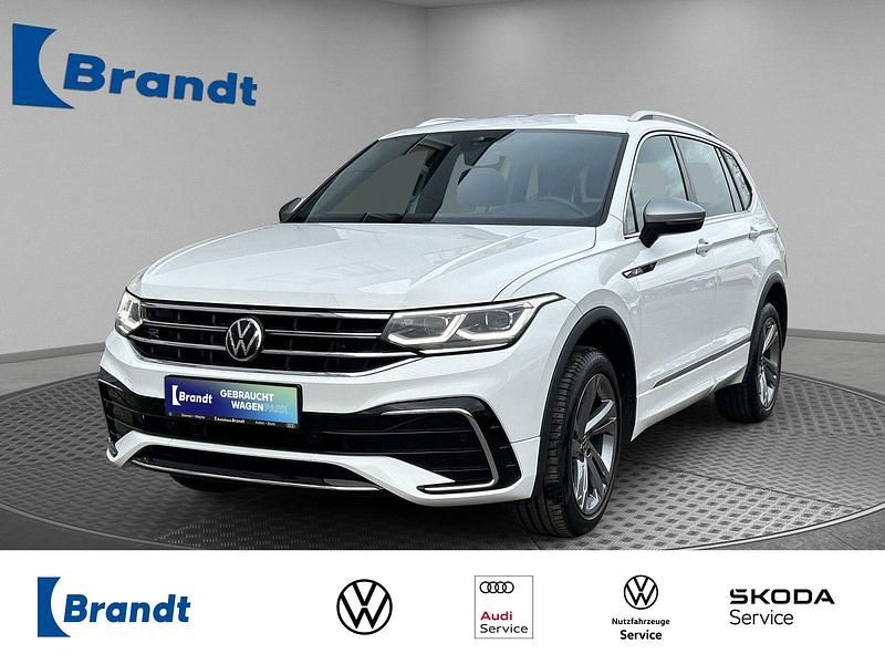 Pure white Gebraucht 2022 VW Tiguan Allspace R-line Plus SUV | 32.690 € (Fairer Preis) - Bild 1/3